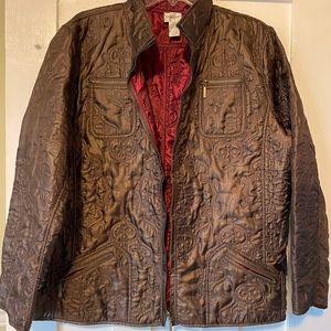Chico’s reversible quilted jacket.Brownish on one side red on the other side.